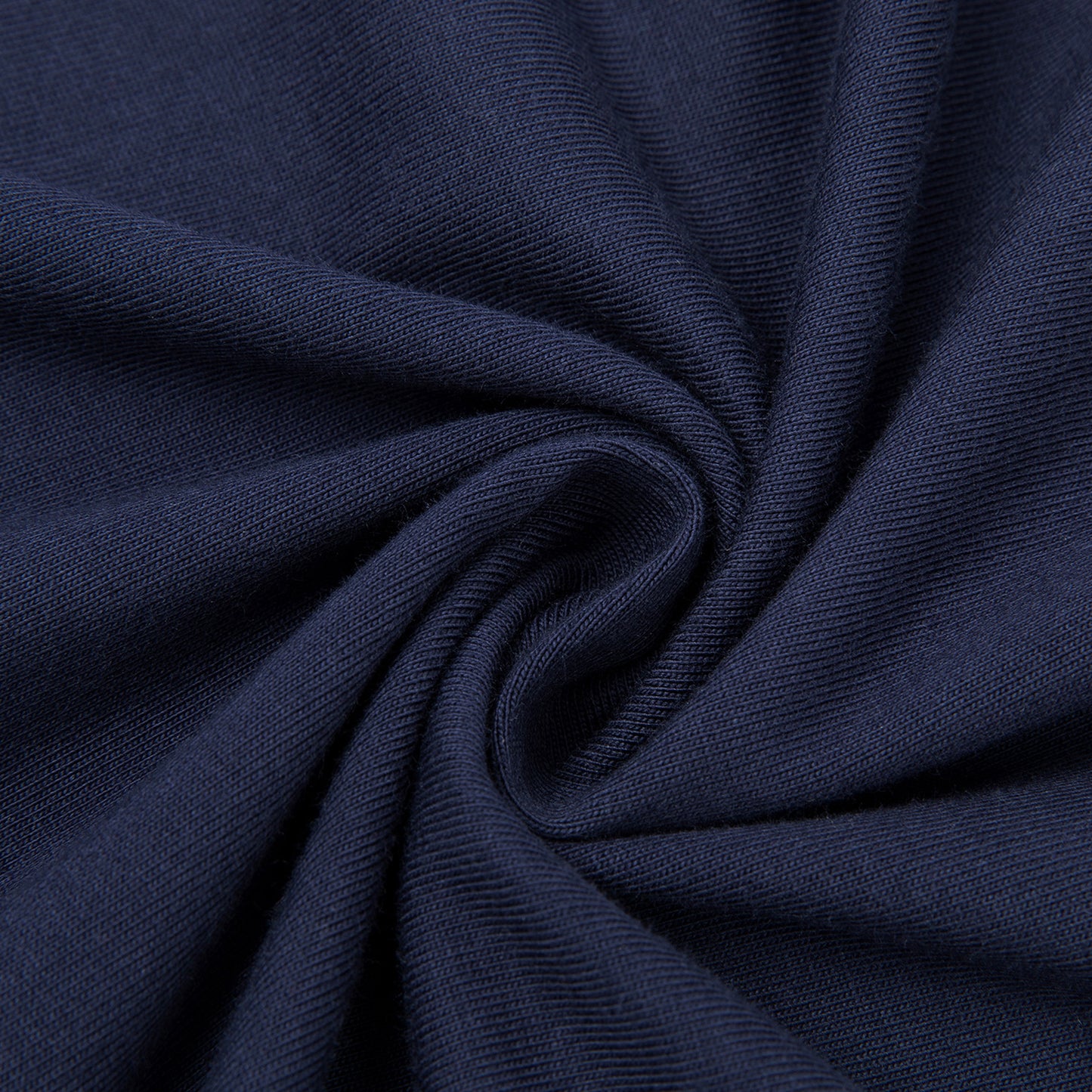 Close-up of dark blue fabric with a textured pattern