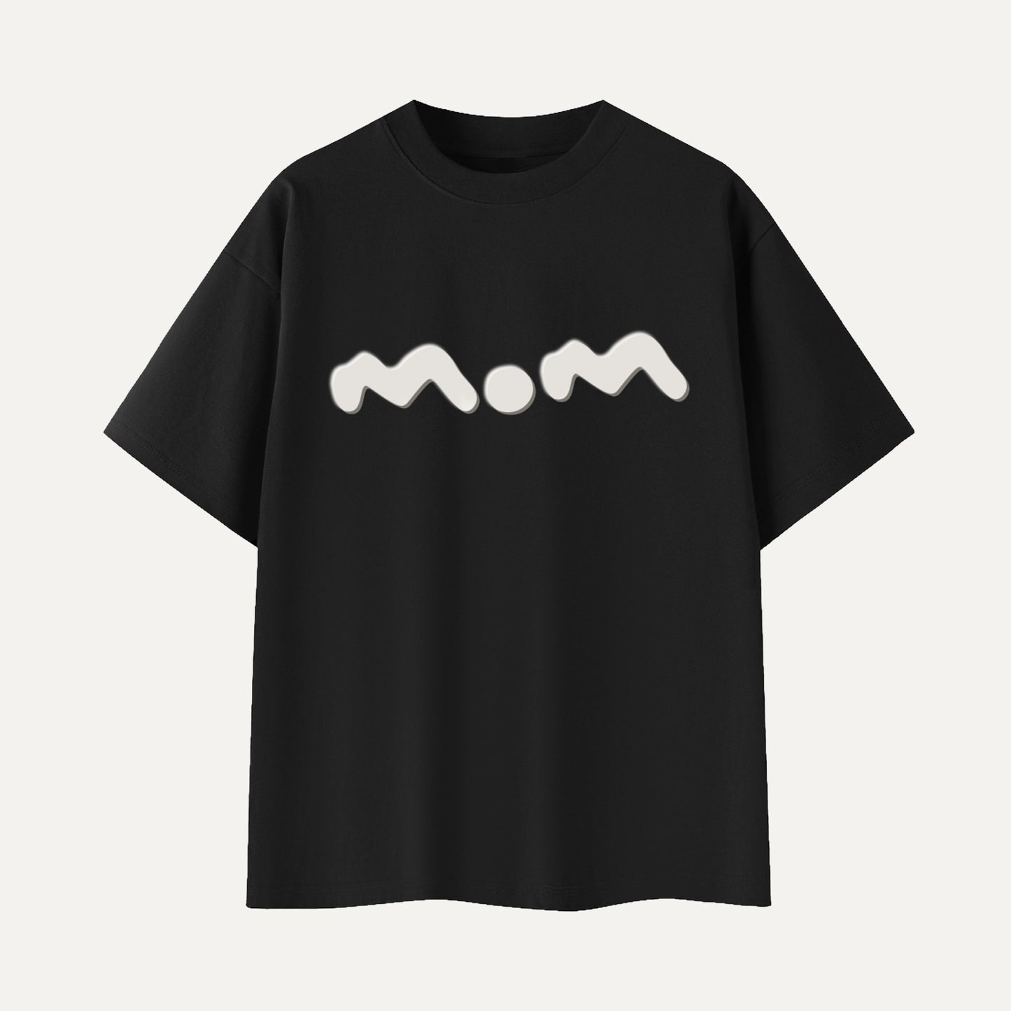 Black t-shirt with 'mom' printed in white on a light gray background