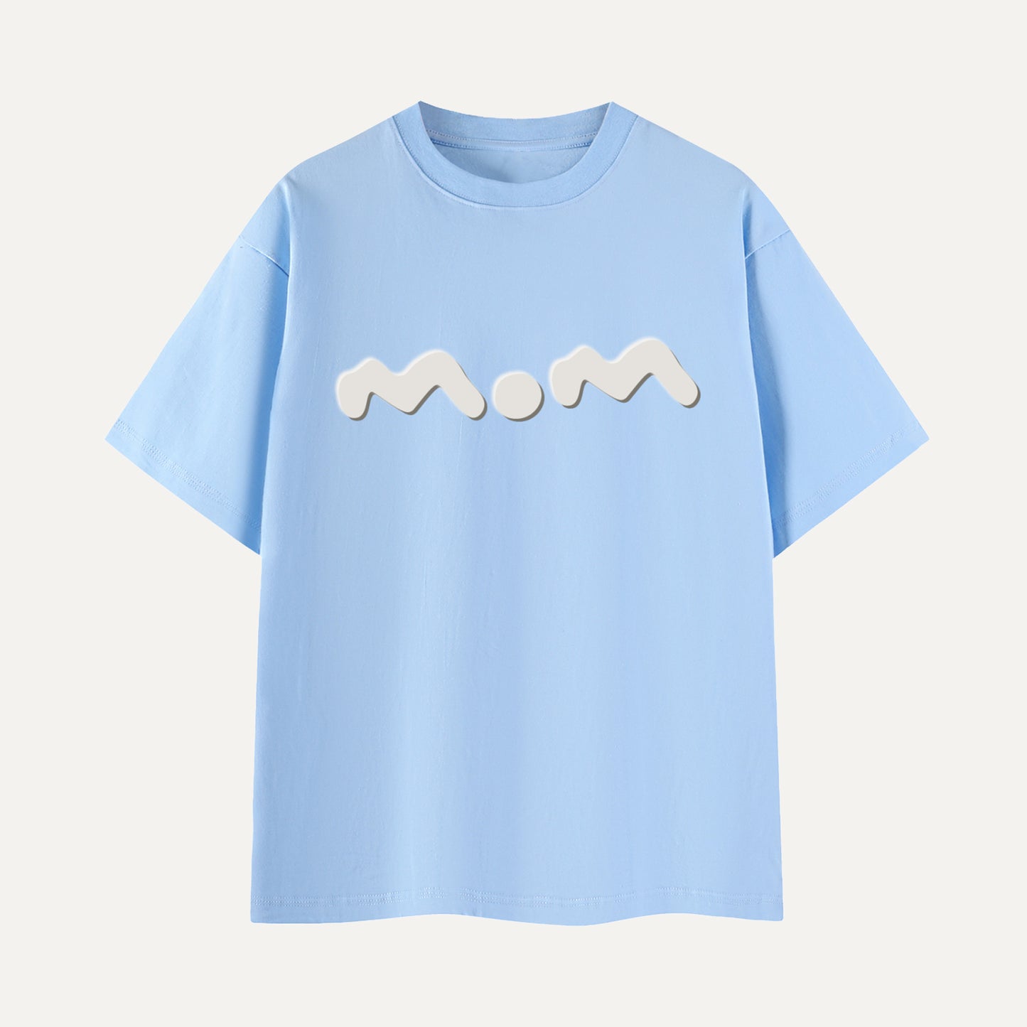 Light blue t-shirt with 'mom' printed on it against a light gray background