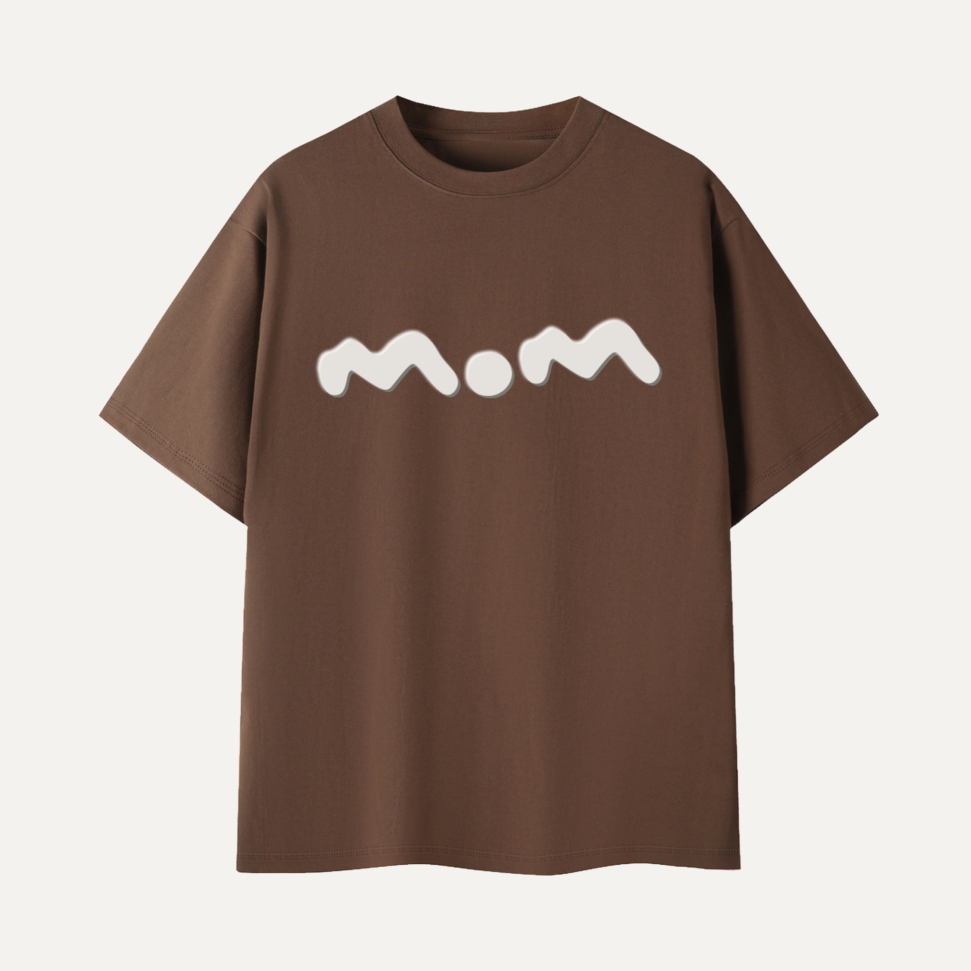 Brown t-shirt with 'mom' printed in white on a light gray background