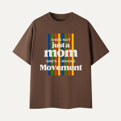 Brown t-shirt with colorful text design on a white background