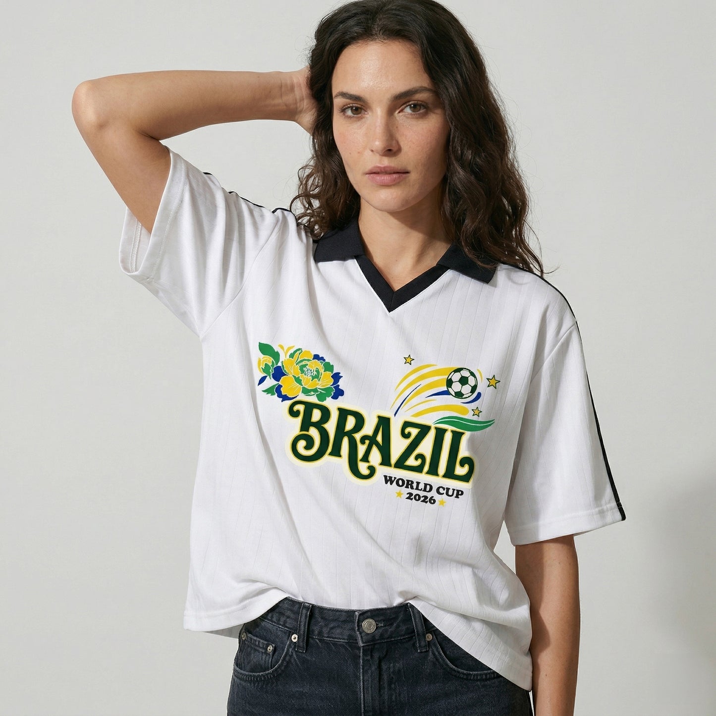 Woman wearing a white Brazil World Cup 2020 t-shirt with a floral design on a plain background