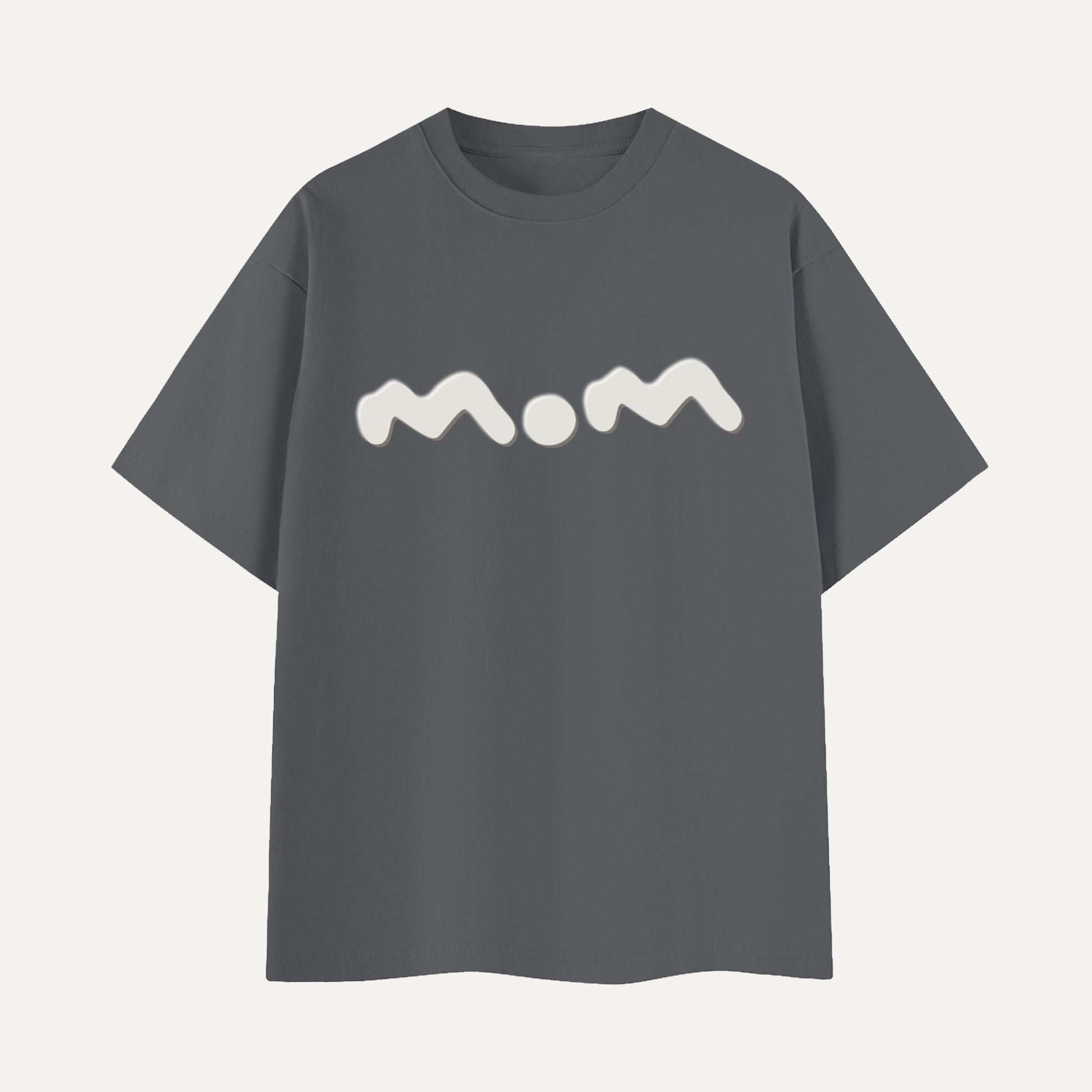 Gray t-shirt with 'mom' printed on it against a light gray background