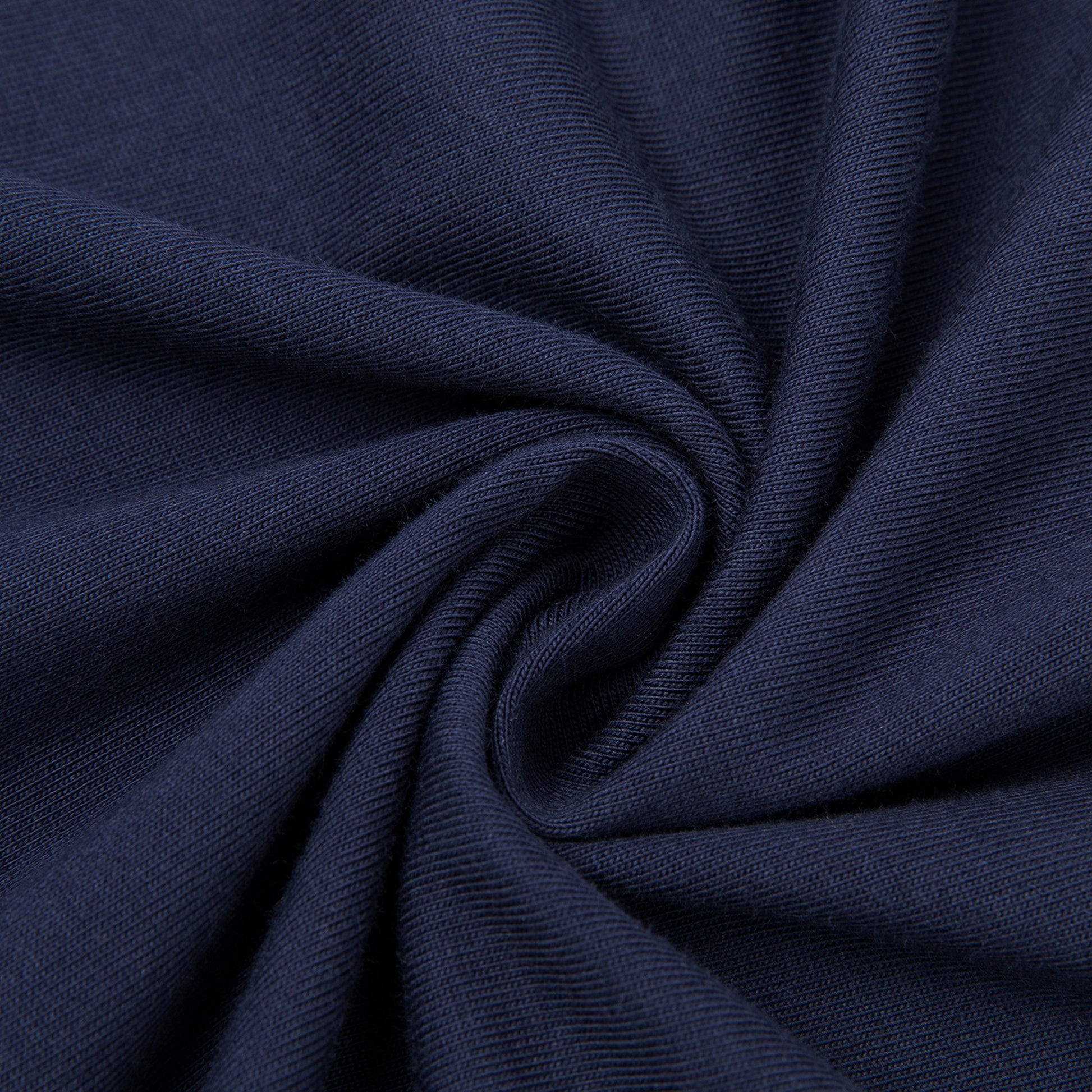 Close-up of dark blue fabric with a textured pattern