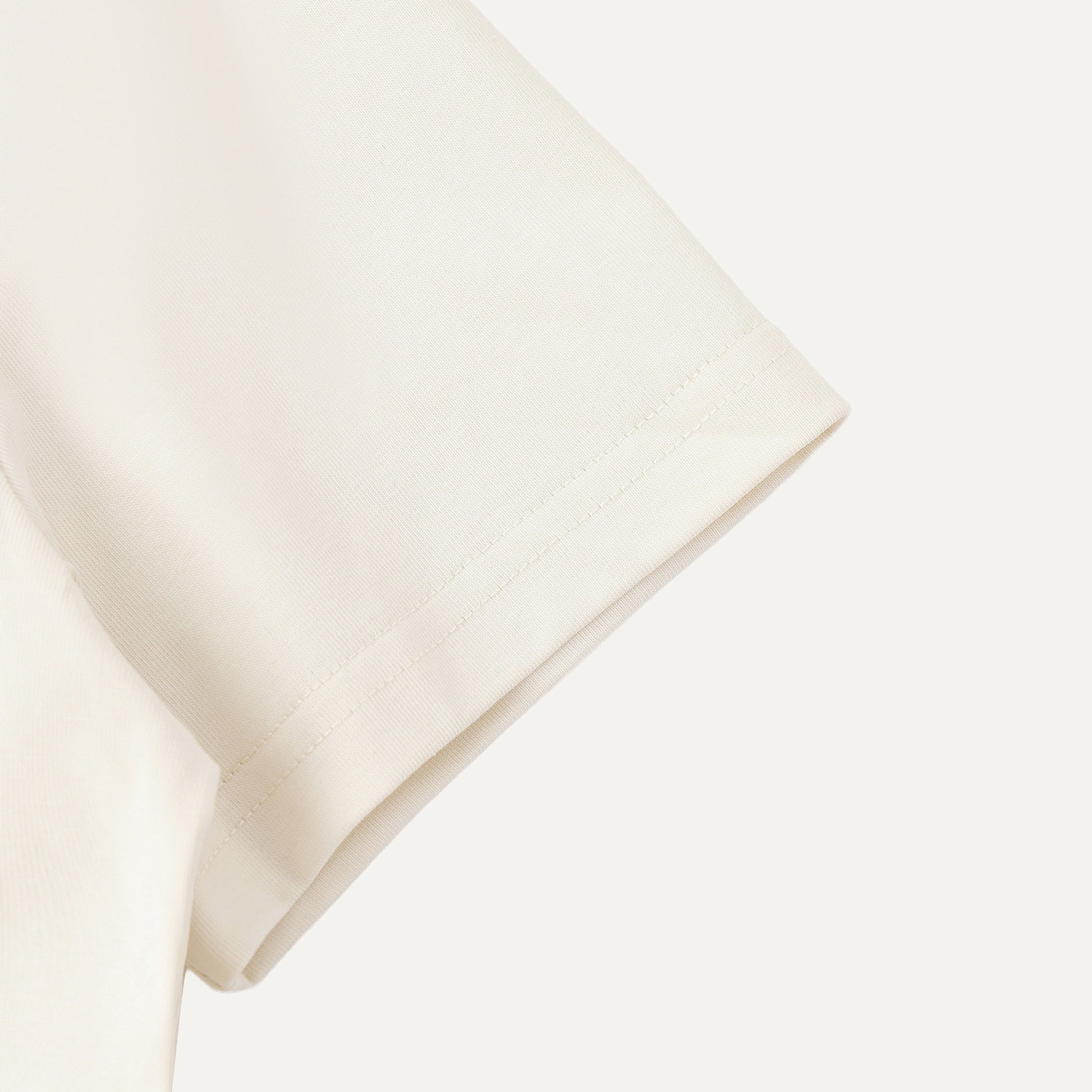 Beige pillow on a white background