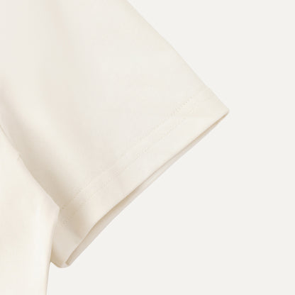 Beige pillow on a white background