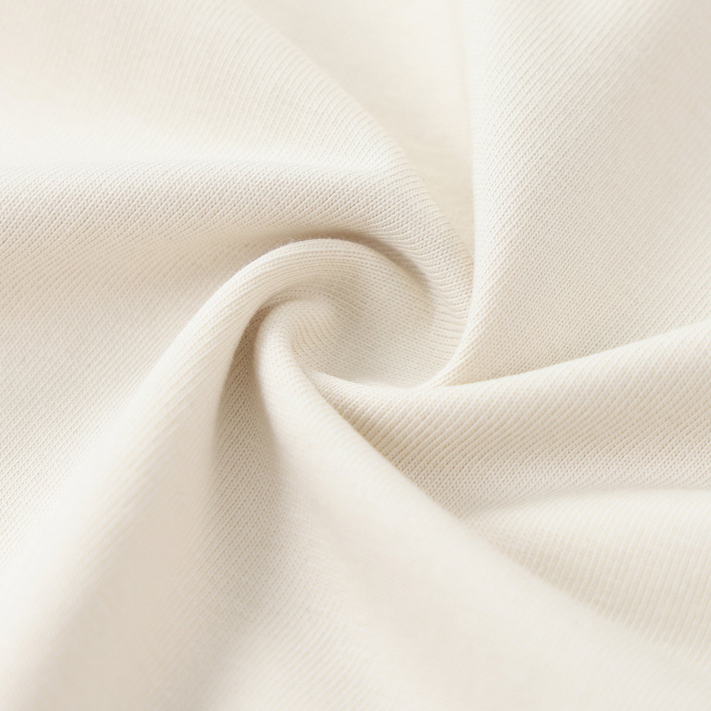 Close-up of beige fabric with a subtle texture