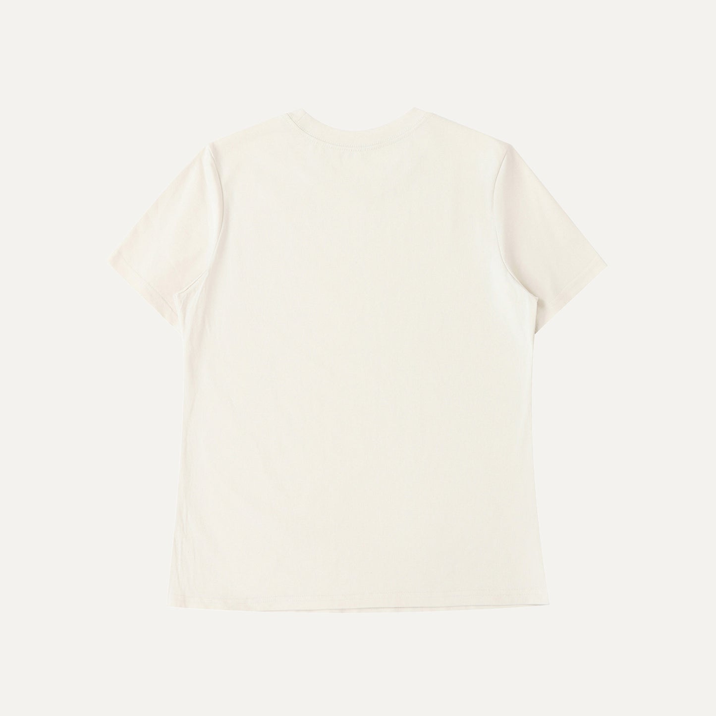 White sweater on a light beige background
