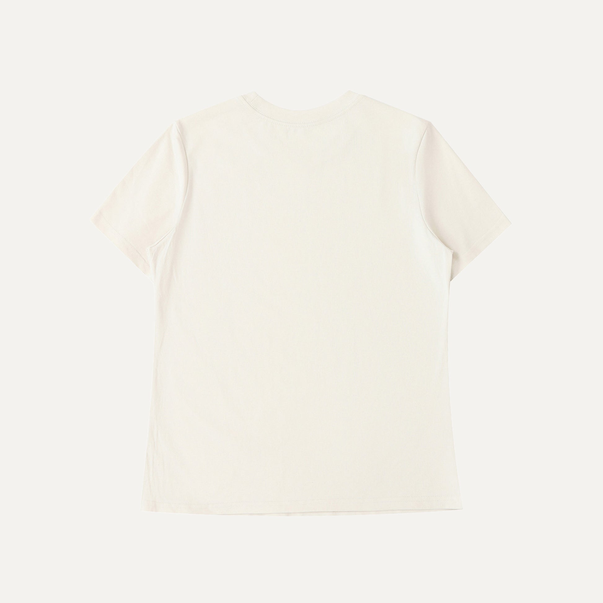 White sweater on a light beige background