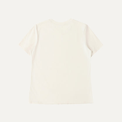 White sweater on a light beige background