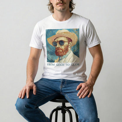 Person wearing a white t-shirt with a graphic of a man in a hat and sunglasses, sitting on a stool.