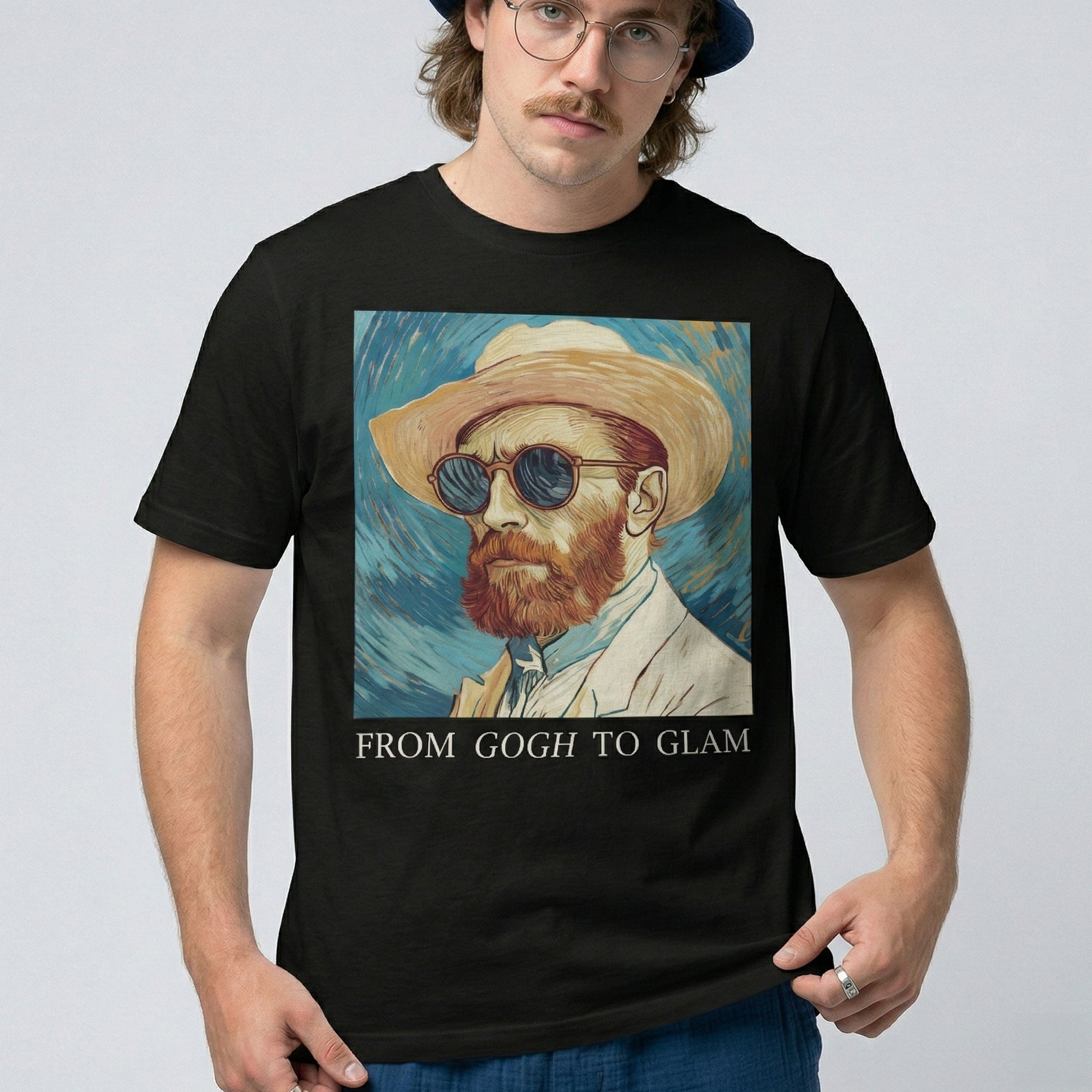 Person wearing a black t-shirt with a Van Gogh-inspired design and text 'From Gogh to Glam'.