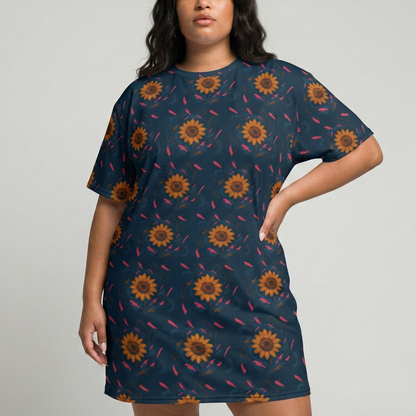 Woman wearing a navy dress with sunflower pattern on a plain background