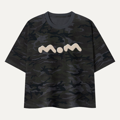 Black camouflage t-shirt with a white graphic on a light gray background