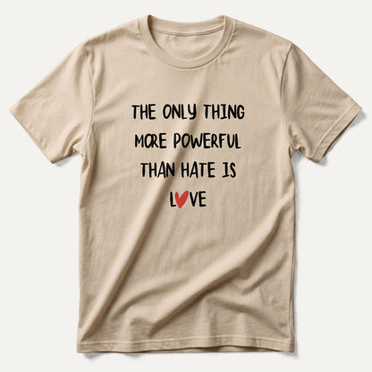 Beige t-shirt with motivational quote 'The only thing more powerful than hate is love' on a white background
