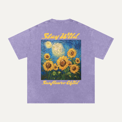 Purple t-shirt with sunflower design and 'Stay Wild Sunflower Child' text on a white background