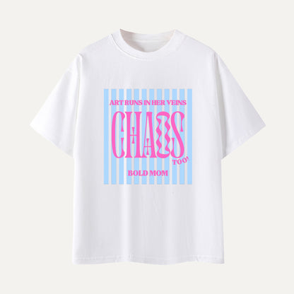 White t-shirt with colorful text design on a light gray background