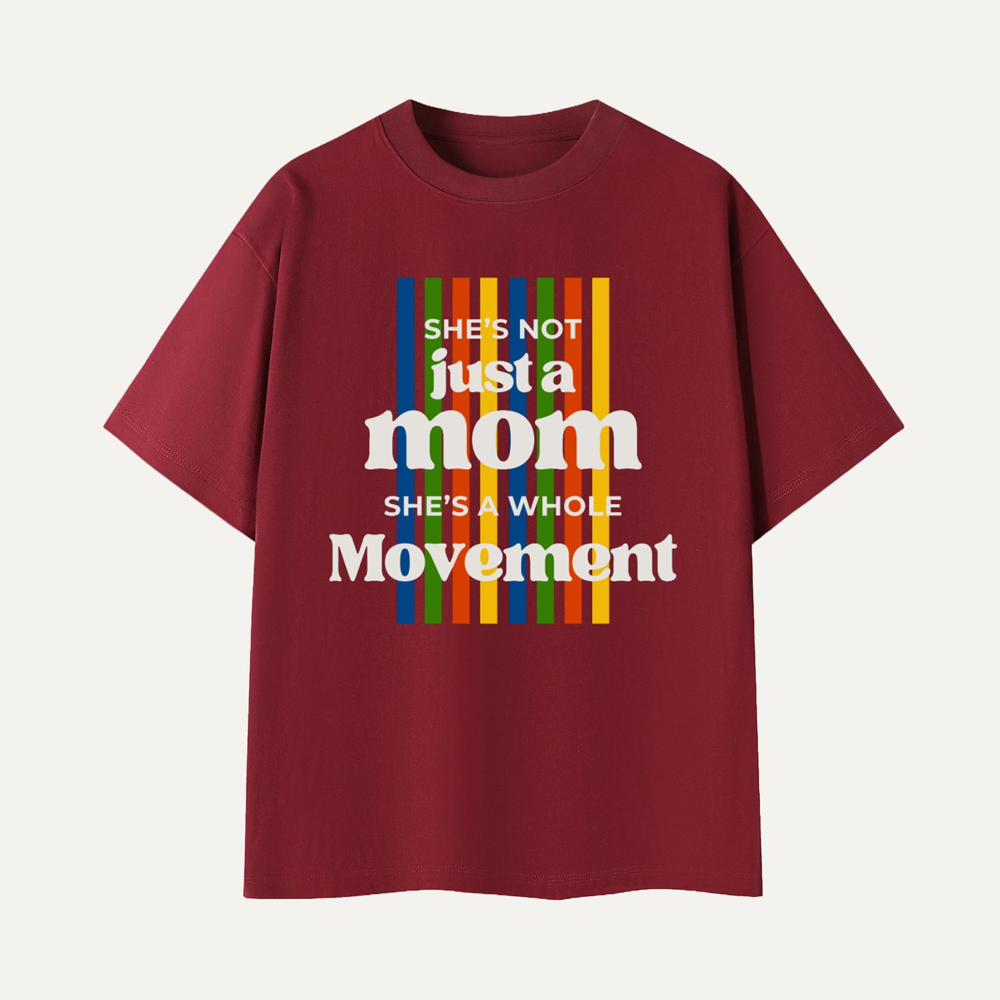 Maroon t-shirt with colorful text design on a white background