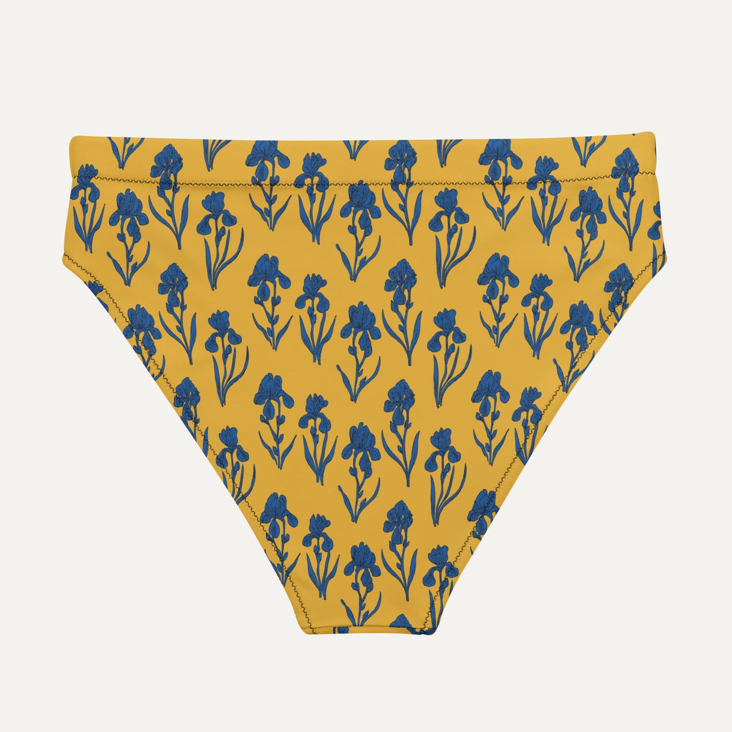 Yellow bikini bottom with blue floral pattern on a white background