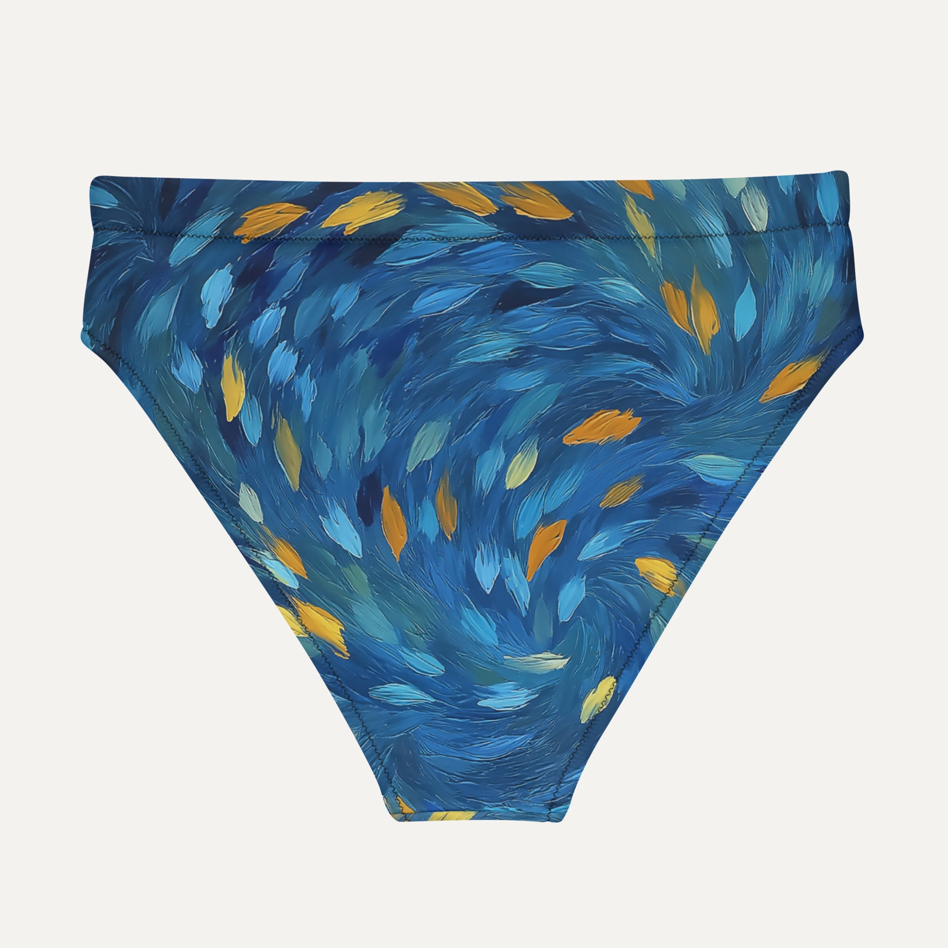 Blue swim bottom with feather pattern on a white background