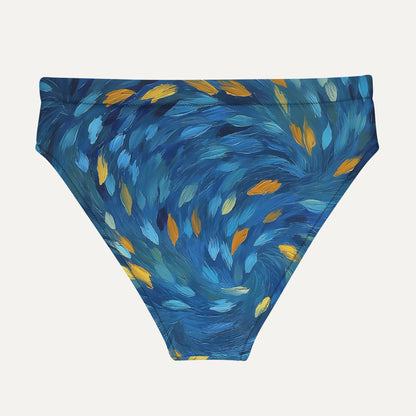 Blue swim bottom with feather pattern on a white background