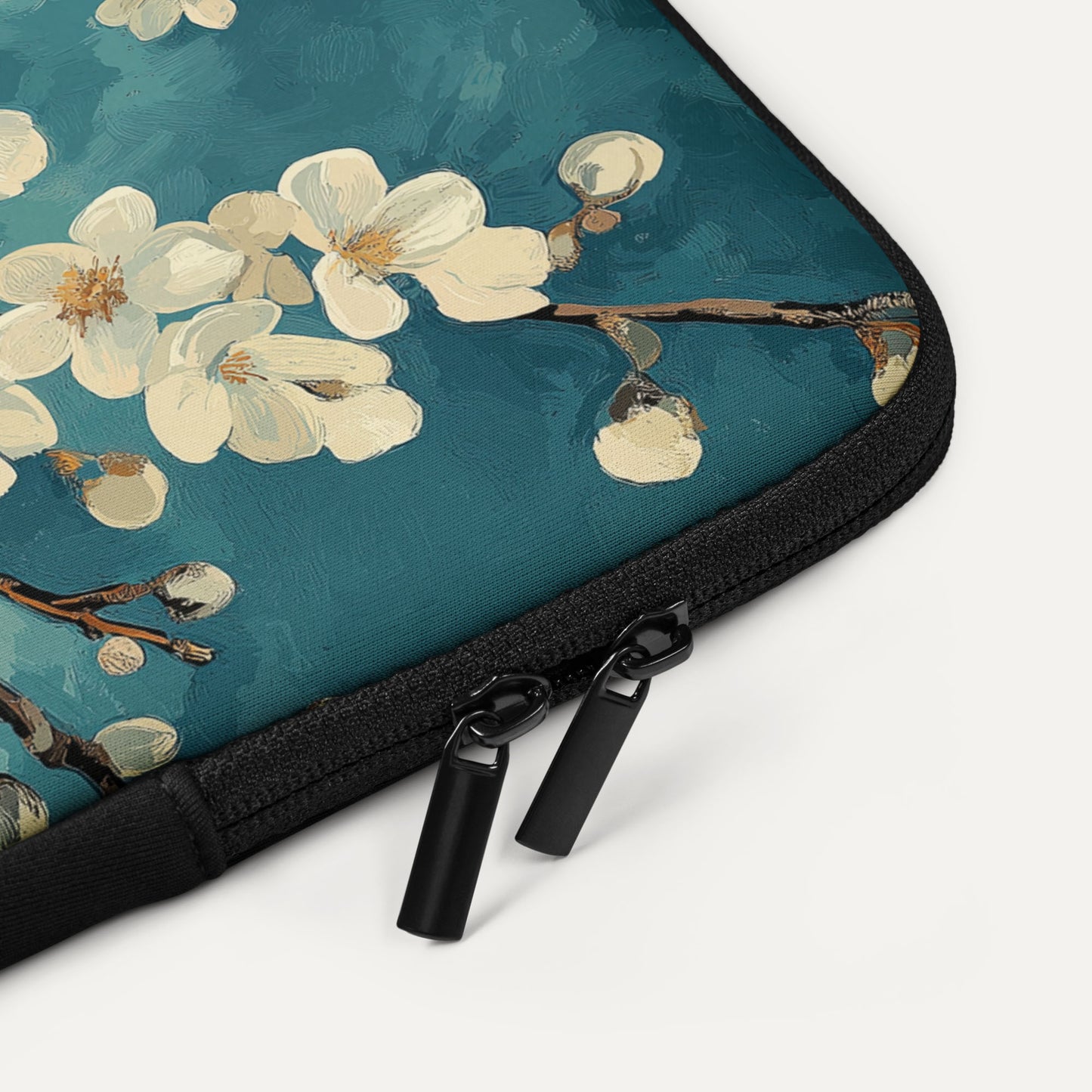 Floral design laptop sleeve with zipper on a white background